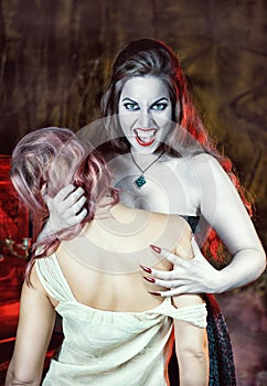 Beautiful vampire and her victim