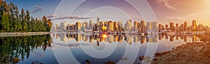 Beautiful Vancouver skyline and harbor with idyllic sunset glow, British Columbia, Canada