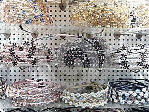Beautiful of variety womans headband on the shelves in the shop.Weddkng dress.Diadems.Jewelry.