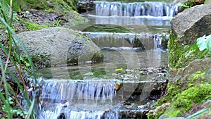 Beautiful veil cascading waterfalls, mossy rocks