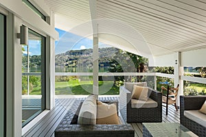 Beautiful veranda with furniture photo