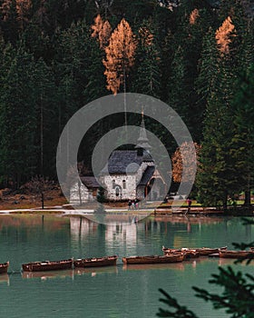 Beautiful vertical shot of a chapel in Fanes Sennes Braies Natural Park located in Bolzano, Italy