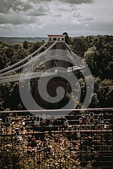Beautiful vertical shot of Clifton suspension bridge over the River Avon in Bristol, United Kingdom.