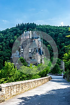 Beautiful vertical shot of the Eltz Castle surrounded by trees in Wierschem, Germany