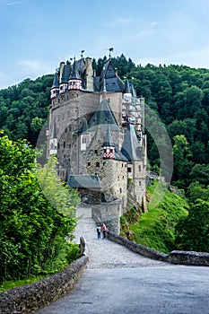 Beautiful vertical shot of the Eltz Castle surrounded by trees in Wierschem, Germany