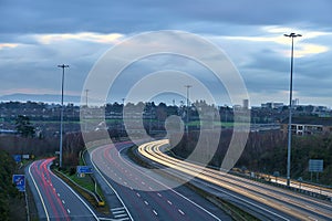 Beautiful very long exposure evening view of light trails of vehicles on motorway M50 Dublin, Ireland