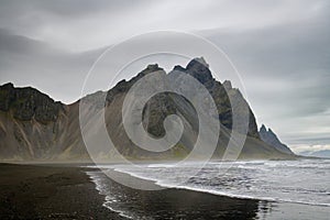 Beautiful Vestrahorn mountain rising above the black sand beach