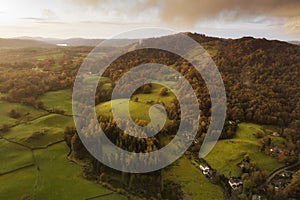 Beautiful vibrant aerial drone landscape image of sunrise in Autumn Fall over English countryside photo