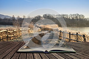 Beautiful vibrant English countryside lake image with frost and