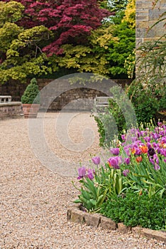 Beautiful vibrant landscape image of quintessential English country garden in Spring or Summer