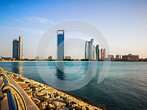 Beautiful view of Abu Dhabi city famous towers, buildings and beach