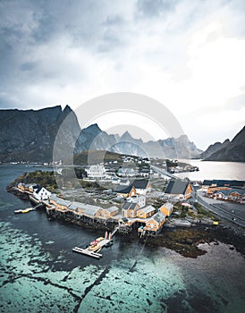 Beautiful view aerial drone of scenic Sakrisoy village Lofoten Islands archipelago scenery with traditional yellow