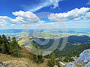 Beautiful view from the alpine peak of Blaue Tosse in the Swiss mountain range of Pilatus and in the Emmental Alps, Alpnach