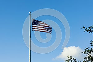 Beautiful view of American flag blue sky with white clouds background