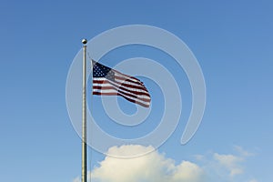 Beautiful view of American flag blue sky with white clouds background