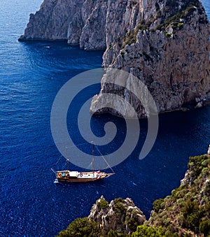 Beautiful view of anchored yachts by Capri Island