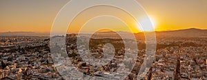 Beautiful view of ancient buildings in Athens city, Greece during sunset