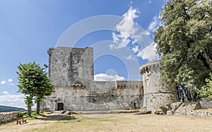 Beautiful view of the ancient Sarteano Castle, Siena, Italy, on a sunny summer day