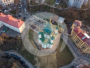 Beautiful view of the ancient street Andrew`s Descent and the St. Andrew`s Church in Kyiv