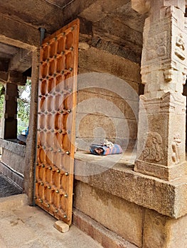 Beautiful view of antique brown color door at entrance of Veerabhadra Hindu temple located in Lepakshi, Andhra Pradesh, India