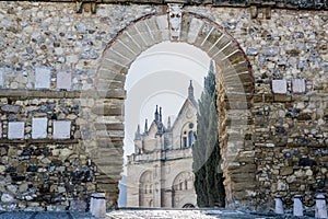 Beautiful view of the Arch of the Giants with the Royal Collegiate Church of Santa MarÃ­a la Mayor in the background