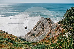 Beautiful view of the Atlantic Ocean from the western point on Cape Roca in Portugal