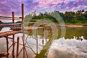 Beautiful view of a bamboo bridge. Laos landscape.