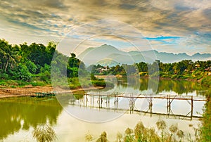 Beautiful view of a bamboo bridge. Laos landscape.