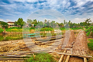 Beautiful view of a bamboo bridge. Laos landscape.