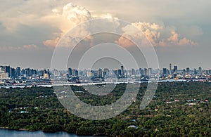 Beautiful view of Bangkok city, Beauty skyscrapers along Chaopraya river in the evening