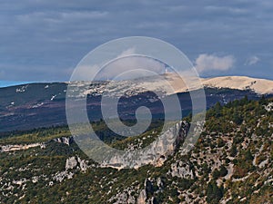 Beautiful view of bare mountain Mont Ventoux above the rocky canyon Gorges de la Nesque in Provence region, France.