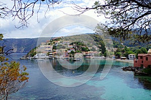 Beautiful view on beach and harbor of idyllic and romantic Assos, Kefalonia, Ionian Islands, Greece