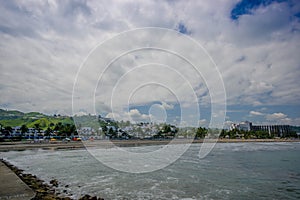 Beautiful view of the beach with sand, in a beautiful day in with sunny weather in a blue sky in Same, Ecuador