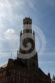 Beautiful view on the Belfry of Bruges - Backlight on the tower