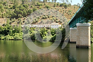 Beautiful view of a bridge over the lake and Belver in a background