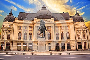 Beautiful view of the building of the Central University Library with equestrian monument to King Karol I in Bucharest, Romania