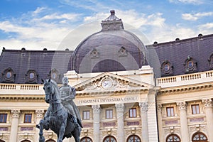 Beautiful view of the building of the Central University Library with equestrian monument to King Karol I in Bucharest, Romania