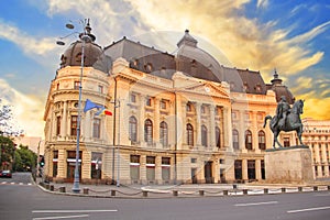 Beautiful view of the building of the Central University Library with equestrian monument to King Karol I in Bucharest, Romania