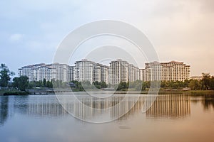 Beautiful view with buildings reflecting on the lake which near hometown