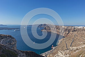 Beautiful view of Caldera with passenger cruises. Santorini, Greece.