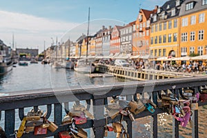 Beautiful view of a canal, colorful buildings in Nyhavn, Copenhagen, Denmark