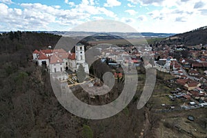 Beautiful view of Cerna Hora castle on a hill in Czechia surrounded by traditional buildings