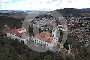 Beautiful view of Cerna Hora castle on a hill in Czechia surrounded by traditional buildings