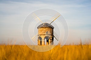 Beautiful view of a Chesterton Windmill in the yellow dry field