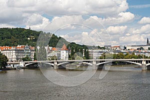 Beautiful view of the City of Prague. Jirasek Bridge over the Vltava river photo