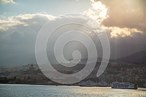 Beautiful view of cityscape and harbor of Messina from ferry, Sicily, Italy