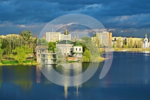 Beautiful view of cityscape in the summer. Church of Blessed Xenia of St. Petersburg on the riverbank of the river Southern Bug