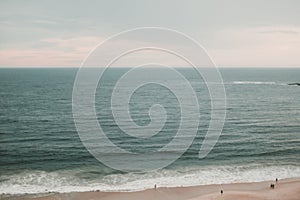 Beautiful view of a clean beach with slashing sea waves