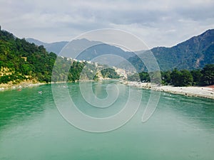 Beautiful view of the clear Ganga river in Rishikesh