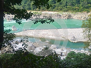 Beautiful view of the clear Ganga river in Rishikesh